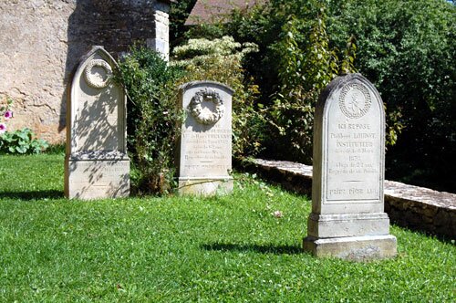 Gravestones near the Romanesque church in Bissy-sur-Fley France.