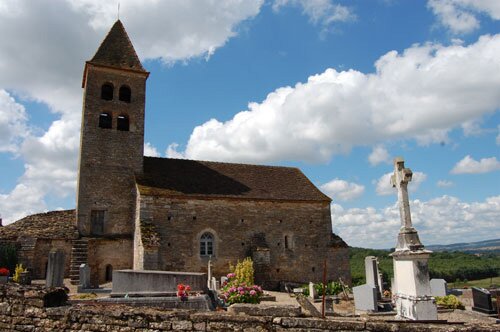 Side view photo of the Romanesque church in Colombier-le-Haut.