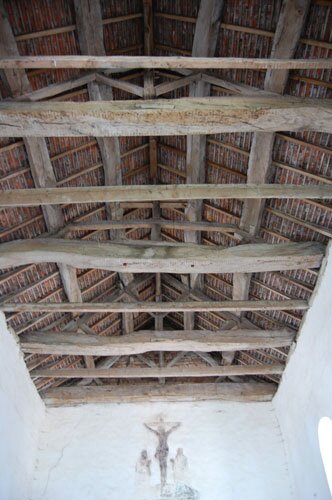 Photo of the roof trusts in the Romanesque church in Colombier-le-Haut.