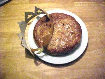 Photo of a Typical Galette des Roi with crown