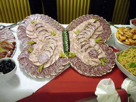 Photo of a French wedding buffet with assorted meats