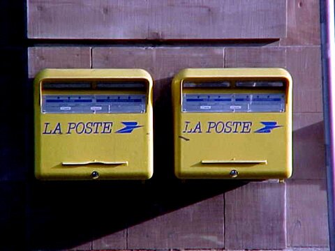Typical French mailboxes.