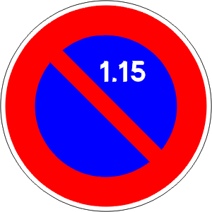 French sign for No Parking This Side During 1-15 Of Month (Stopping OK if you stay next to your vehicle)