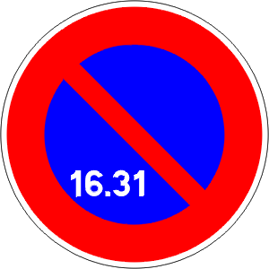 French sign for No Parking This Side During 16-31 Of Month (Stopping OK if you stay next to your vehicle)