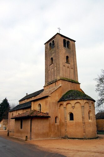 Photo from the east of the Romanesque Church in the village of Saint Vincent des Pres in Burgundy France.