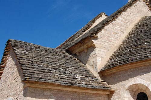 Photo of the Romanesque Church roof of Santilly in France.
