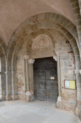 Romanesque doorway of the church in Mont Saint Vincent France.